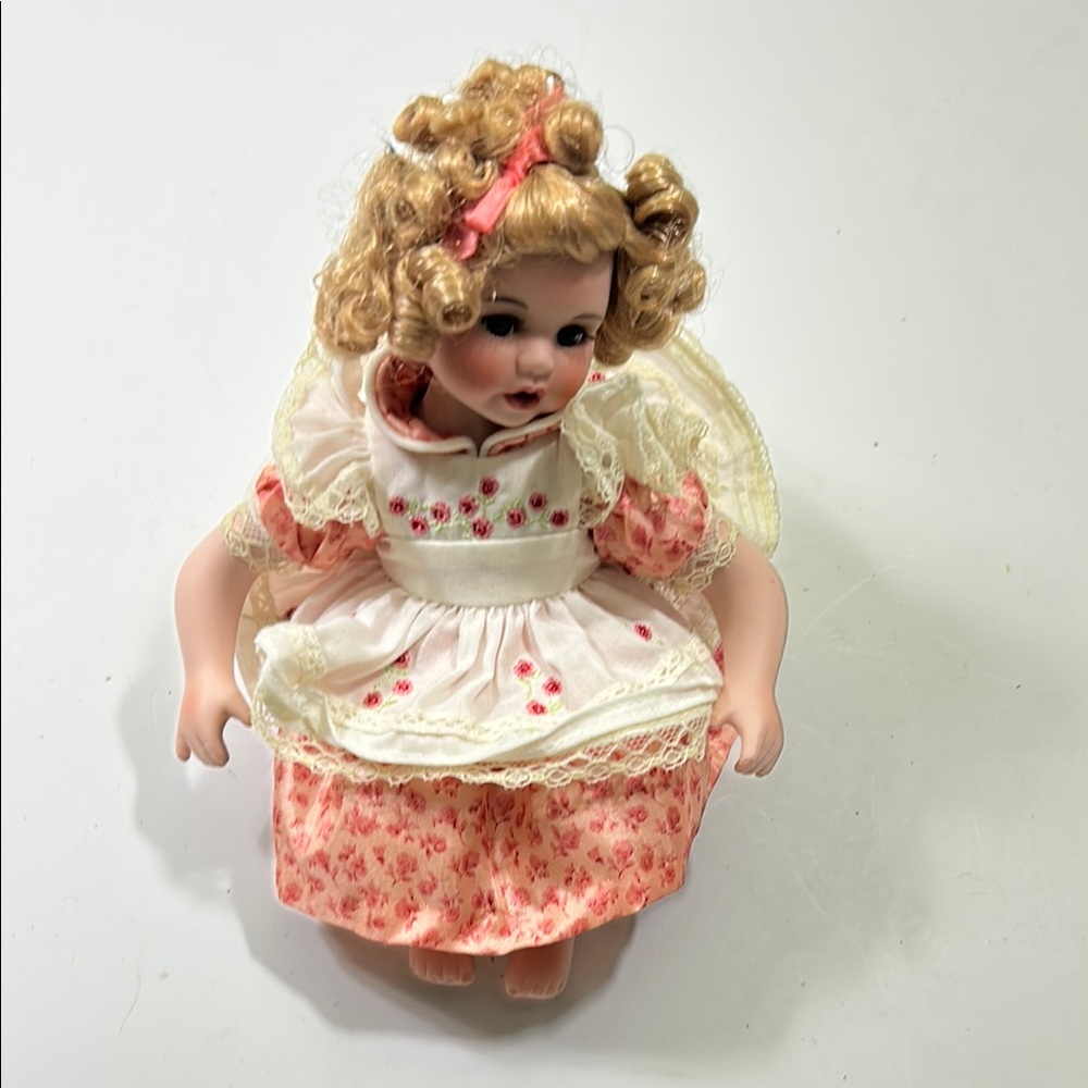 Charming Pink and White Doll with Curly Hair